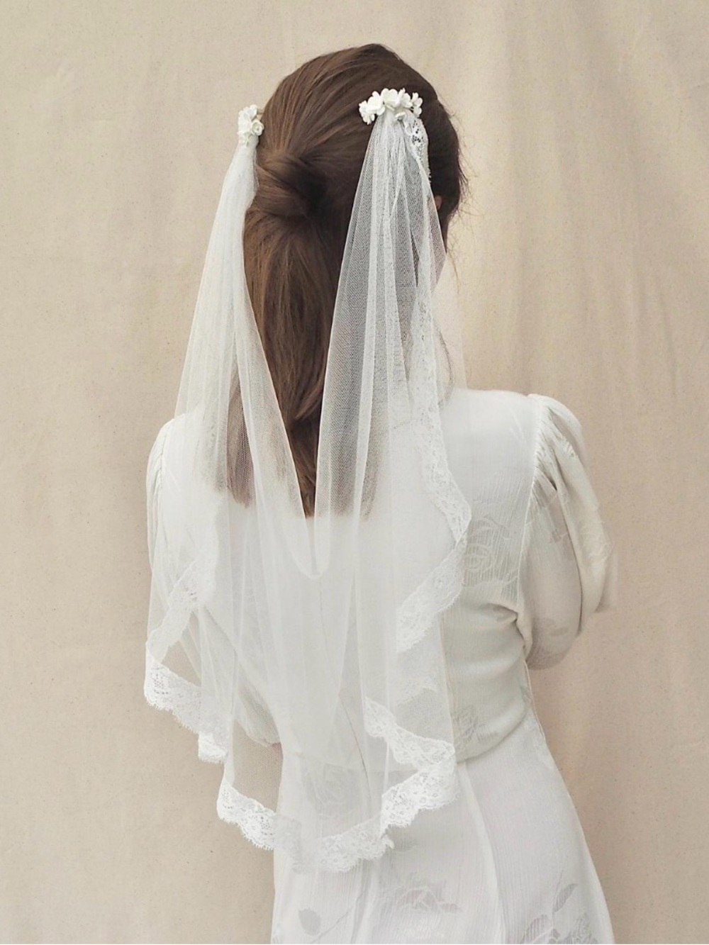 Blossom draped wedding veil with Trinity lace, available in soft ivory